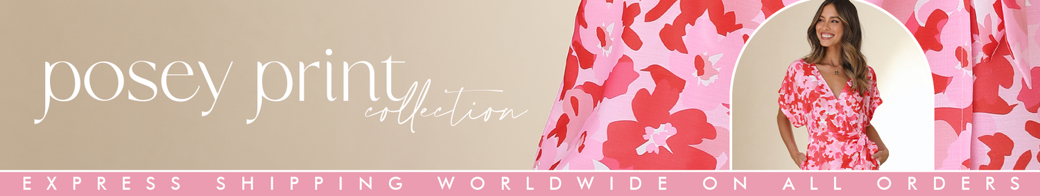 Women wearing a red and pink printed dress. Shop Posey print dresses at Billy J