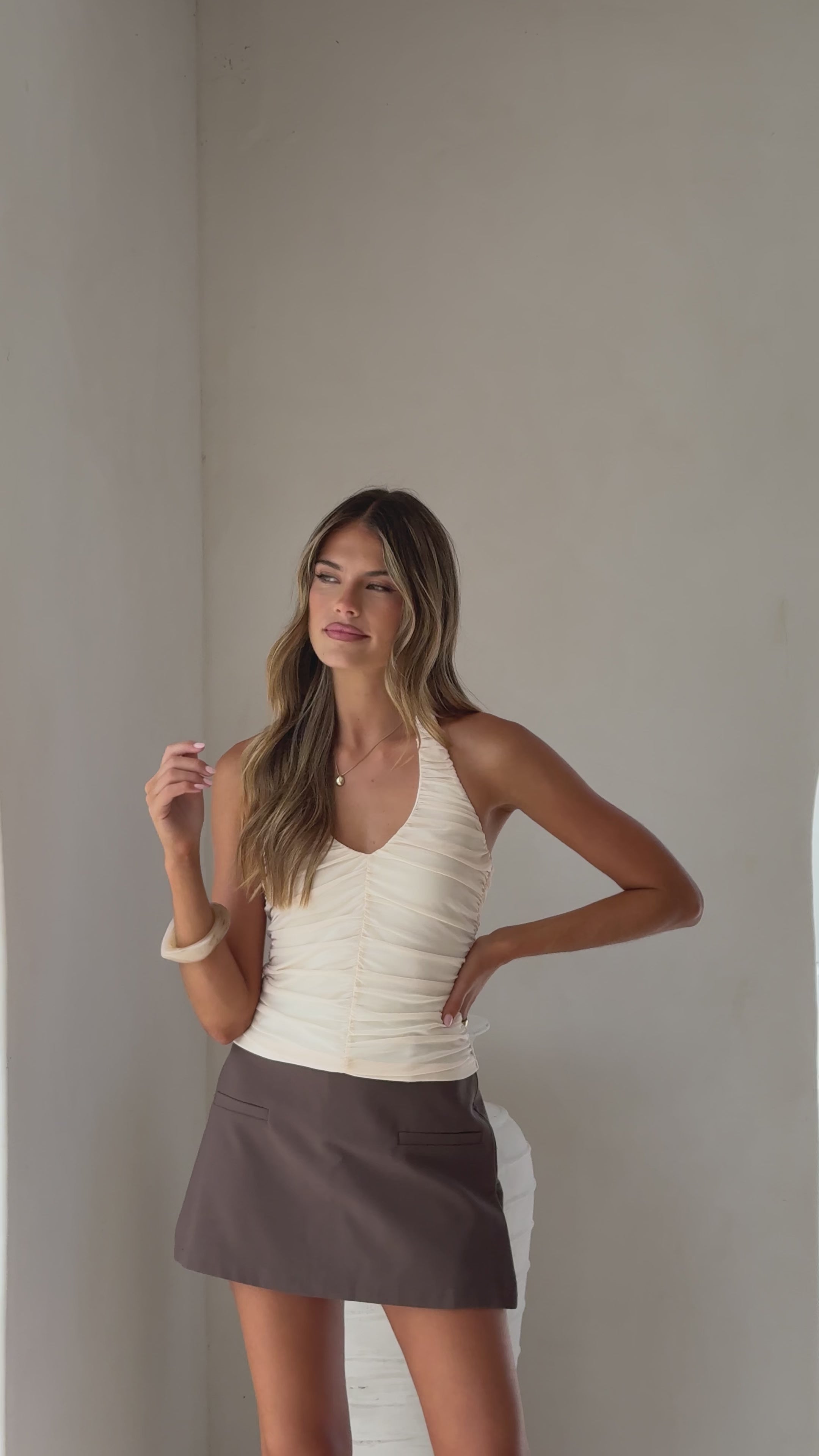 Load video: Kylie Halter Neck Top - Cream - Billy J