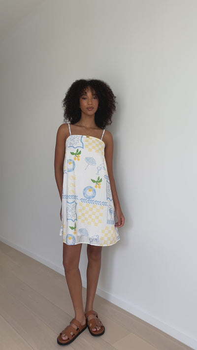 Load and play video in Gallery viewer, Bethani Mini Dress - Blue / Yellow Holiday Print
