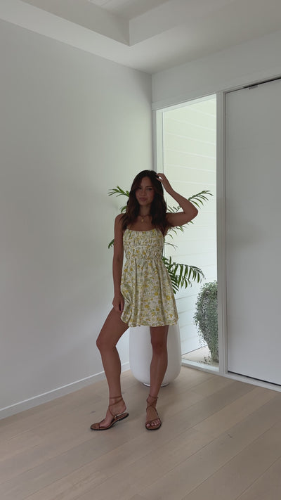 Load and play video in Gallery viewer, Zaire Mini Dress - Yellow Floral
