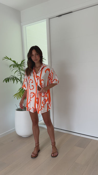 Load and play video in Gallery viewer, Charli Button Up Shirt and Shorts Set - White / Orange Tribal
