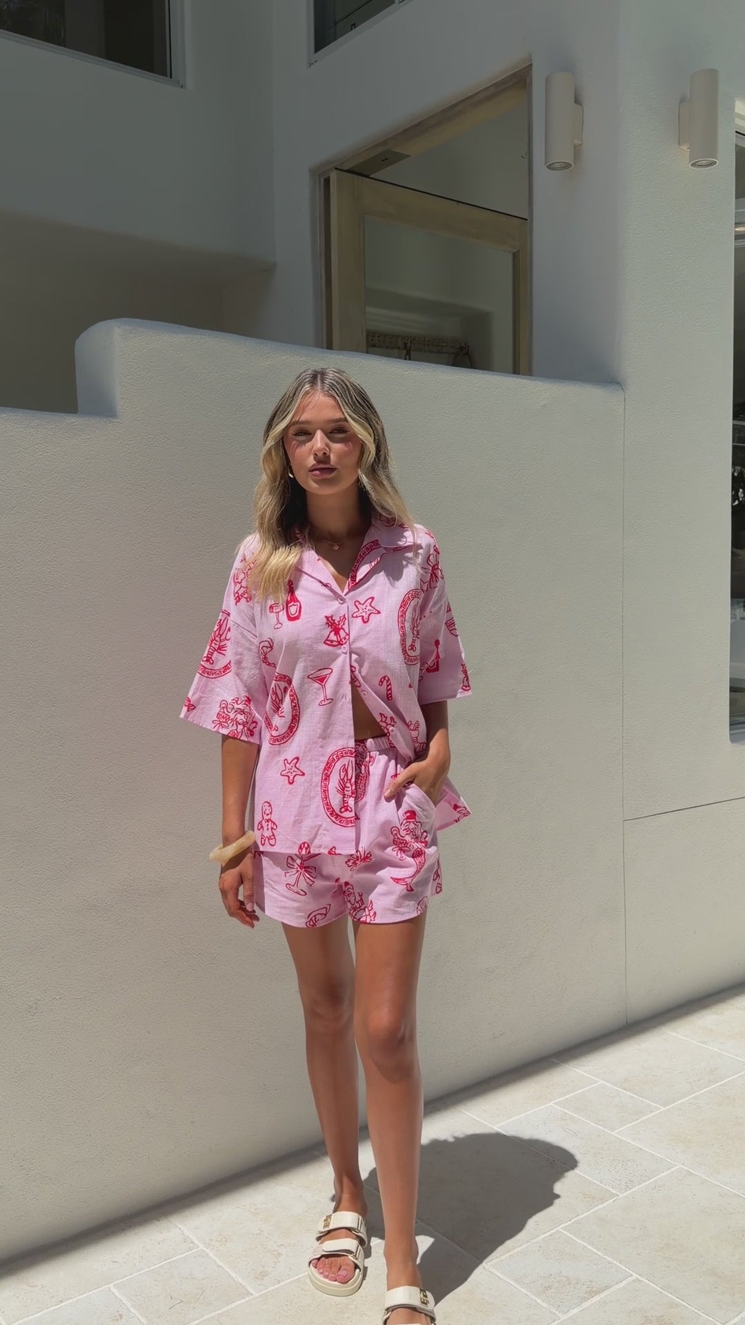 Load video: Cinthia Button Up Top and Shorts Set - Pink Festive Print - Billy J